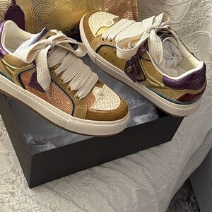 Kurt Geiger SouthBank sneakers NWT. Stylish Gold and Purple hues. Size 41/ 10.